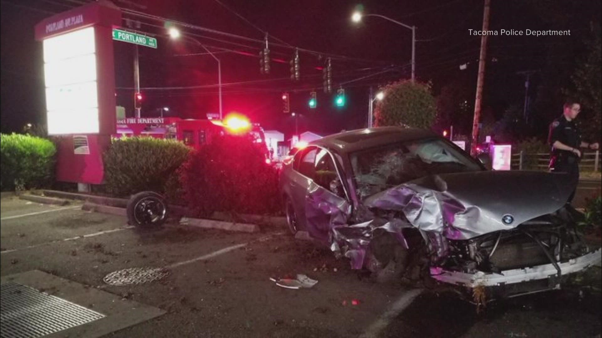 A driver was arrested after running a red light and crashing into a Tacoma police vehicle. Police said the driver was taken into custody after a short foot pursuit.