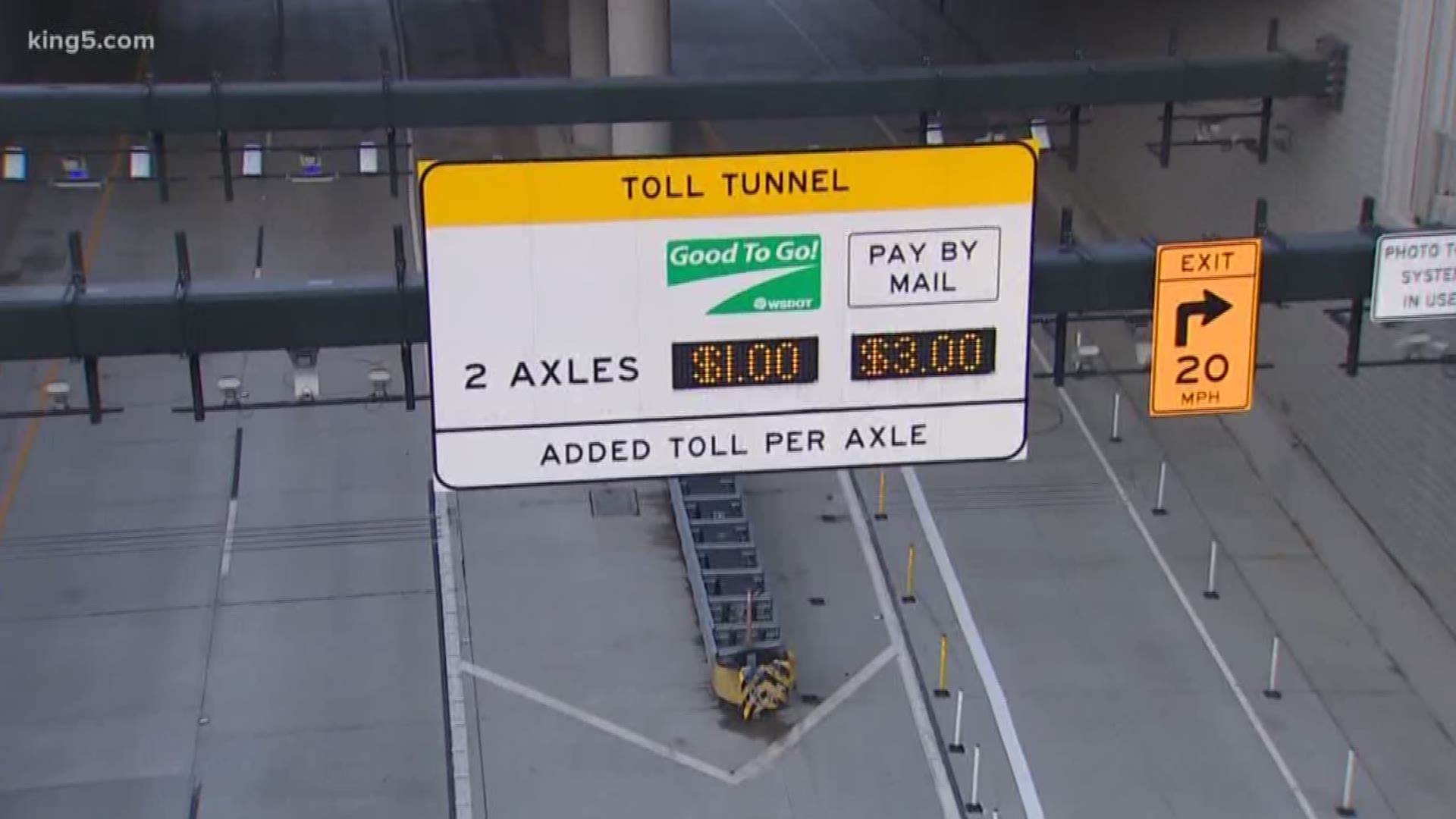 Traffic through Seattle's SR 99 tunnel is down 35% since tolling began on Saturday. But the true test comes Tuesday for the first true weekday commute.