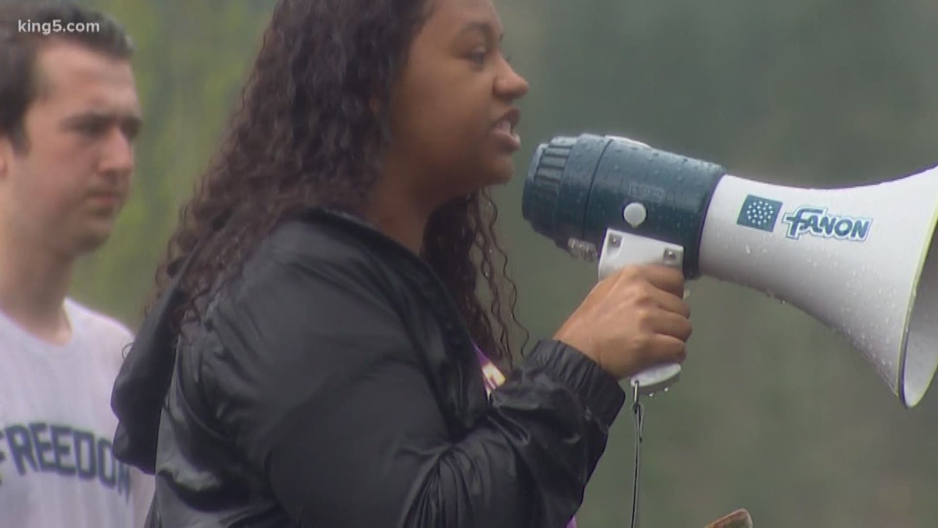 Students at Issaquah High School walked out of class Wednesday to protest a racist sign involving two of their classmates. KING 5's Michael Crowe reports.