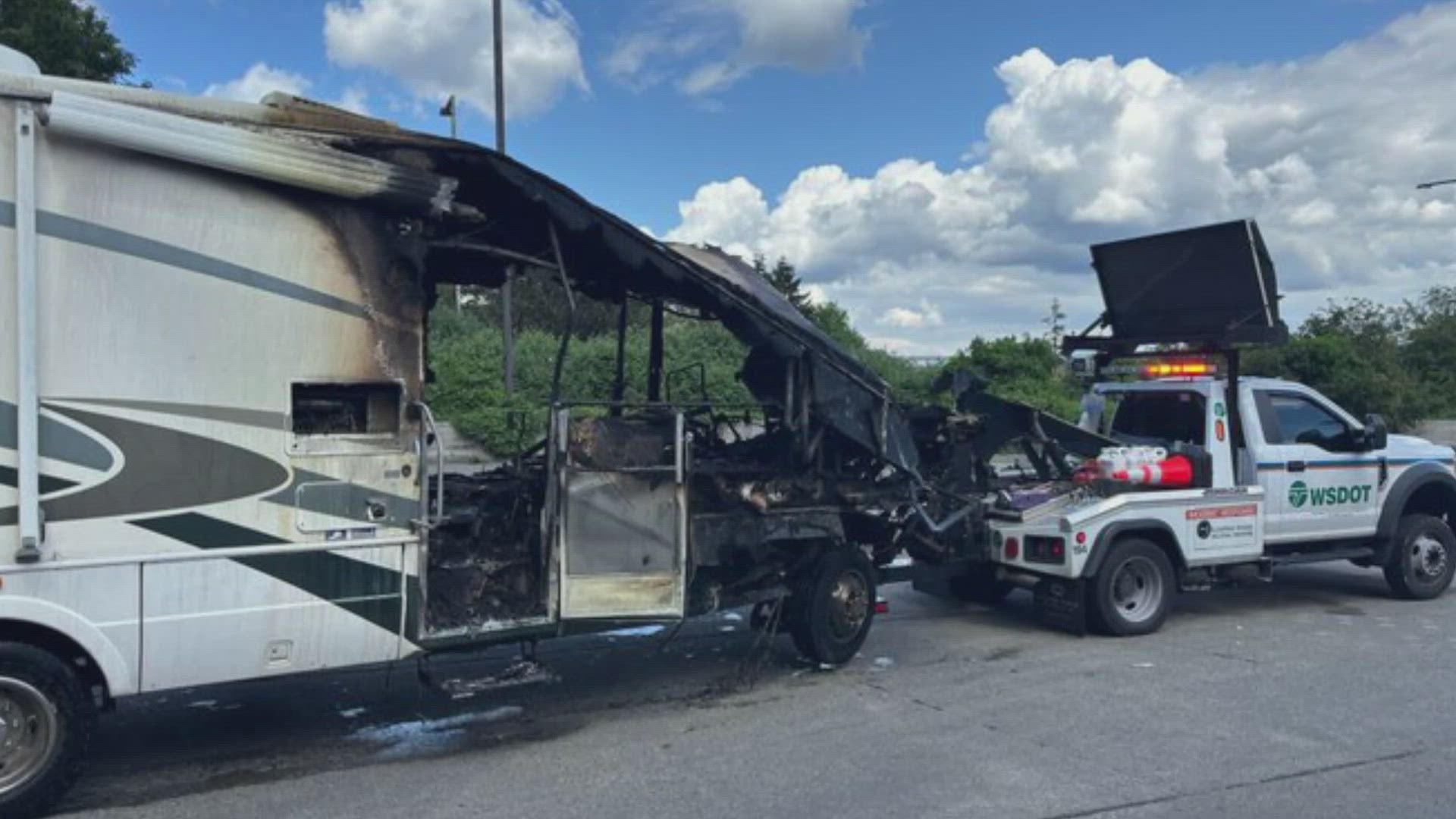 The crash and fire occurred around noon on Monday, but the eastbound lanes of Interstate 90 remained closed hours later, snarling the evening commute.