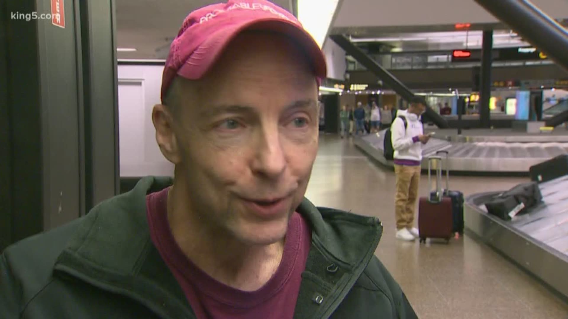 Frank King, quarantined overseas because of covid-19, landed at Sea-Tac airport tonight with no quarantine restrictions.