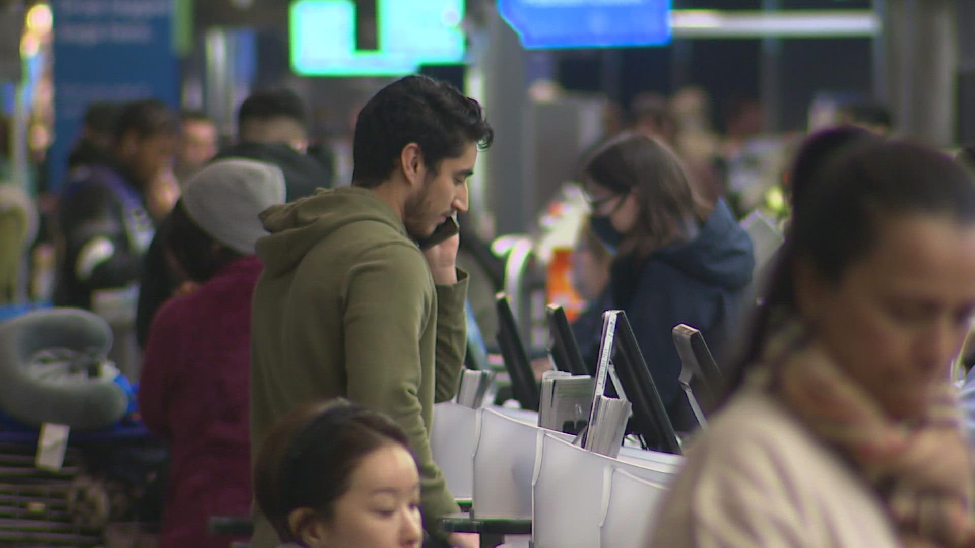 Travelers at Seattle-Tacoma International Airport had to navigate hundreds of flight cancellations Saturday as weather issues continued.