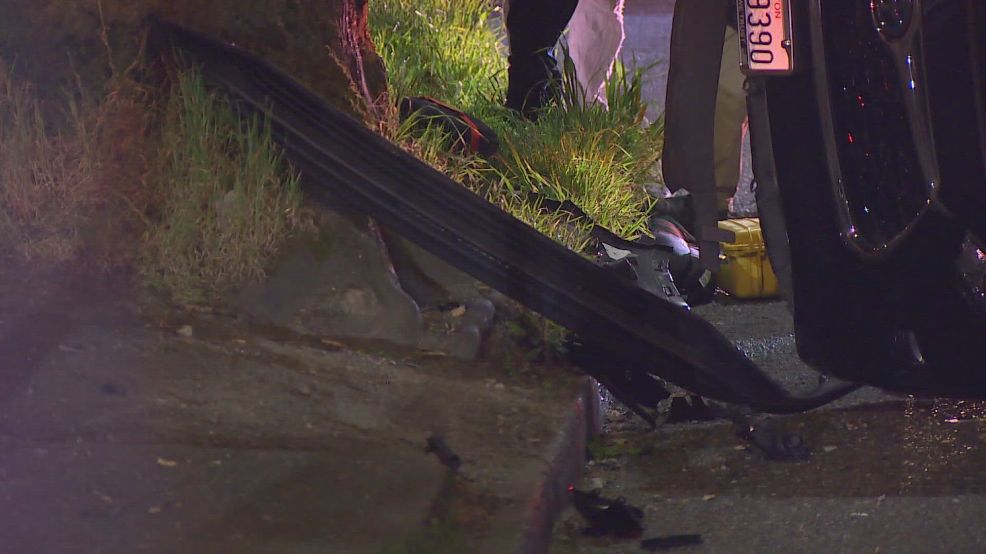 An SUV hit a tree and flipped, blocking Rainier Ave in Seattle's Beacon Hill neighborhood