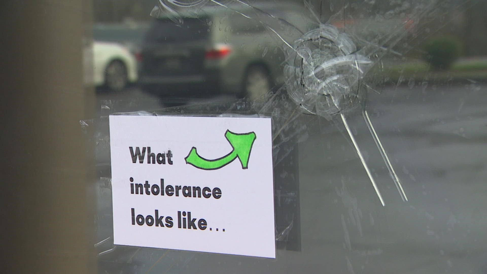 Renton police say they are searching for a suspect after someone shot through the window of a local taproom with a BB or pellet gun ahead of a planned drag event.
