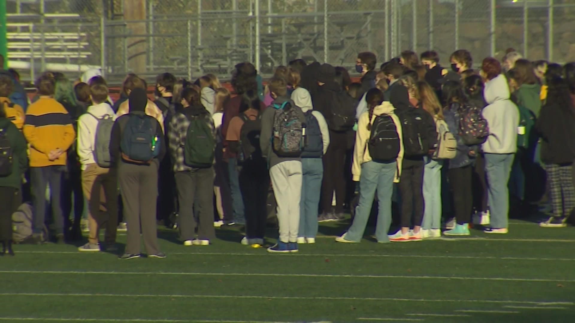 More than 100 students staged a walkout Tuesday at Cedarcrest High School over the school's response to a Halloween photo posted by students.