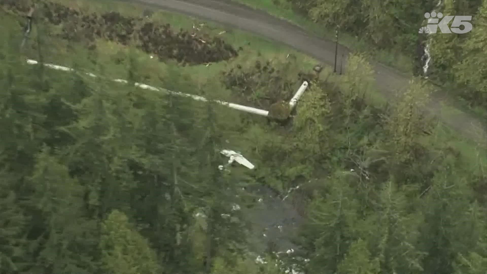 Two people were rescued after a small plane crashed near the Green River on April 23, 2022. The victims were trapped about 60 feet down an embankment