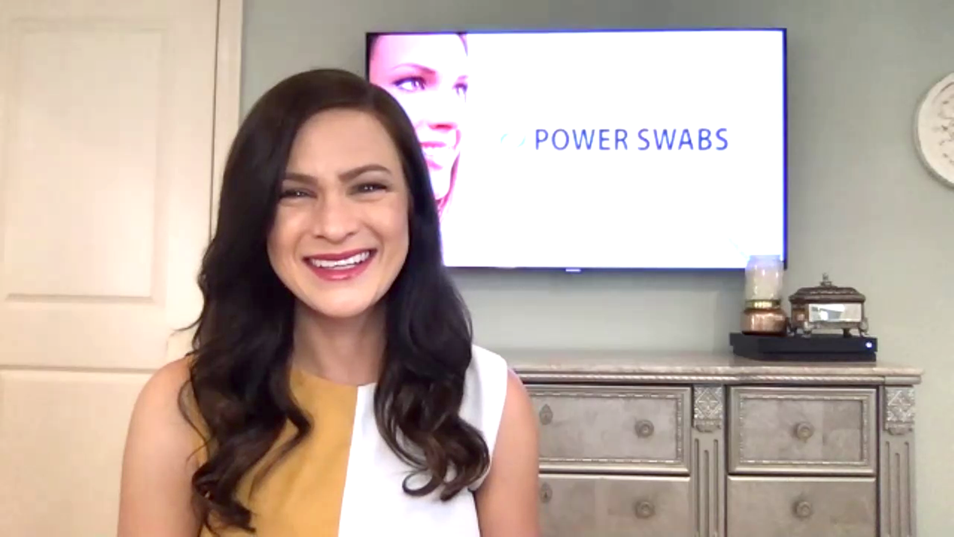 Stephanie Jacolie demonstrates the Power Swabs teeth whitening system.  Sponsored by Power Swabs.