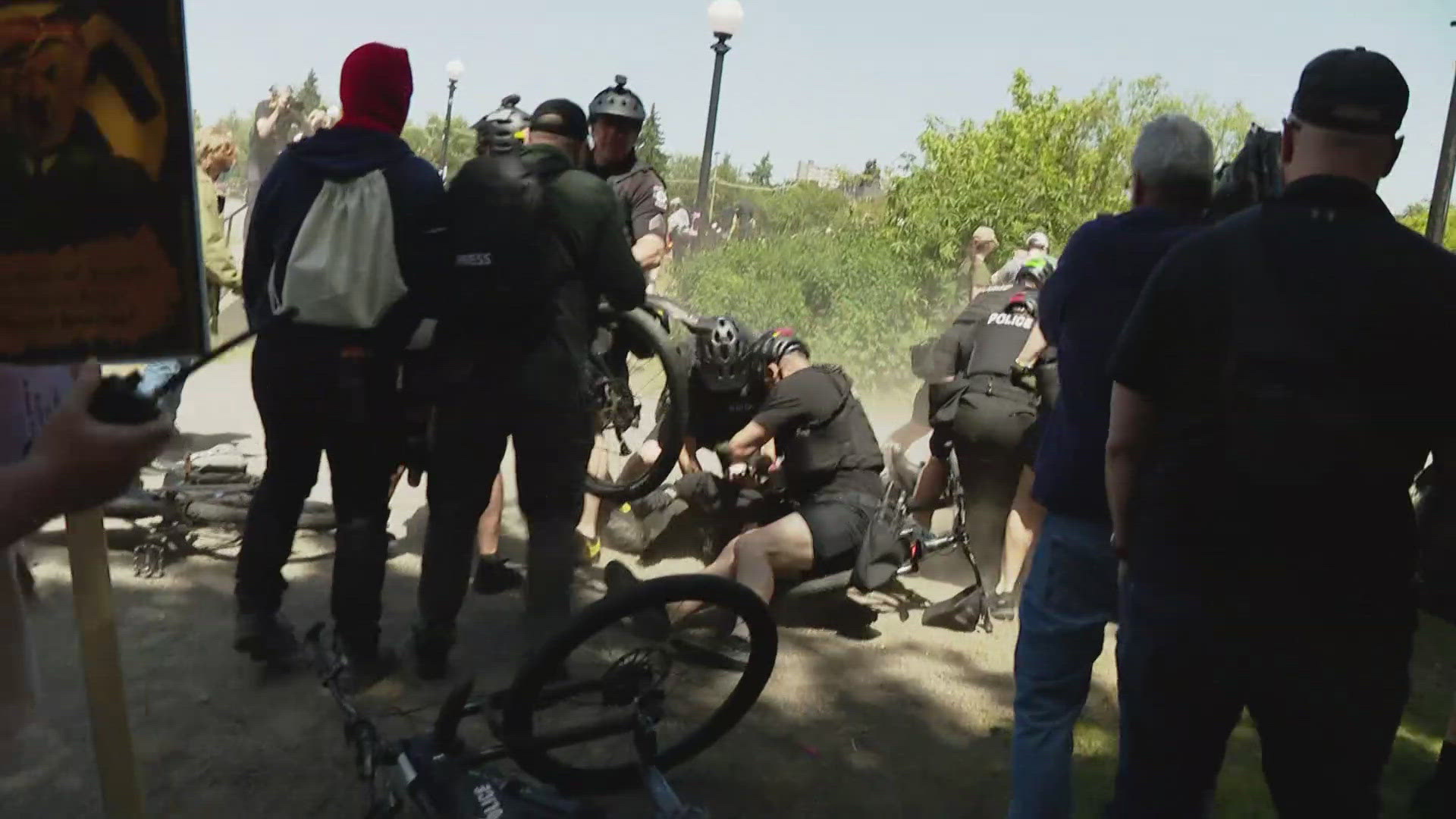 Court documents say eight protestors attacked officers. The officers' union shared frustration with city leaders for putting them "into a political quagmire."