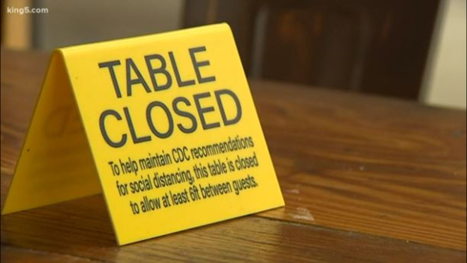 Restaurants that are open in Seattle want to keep guests safe while also recouping some of the money they've lost during the lockdown.