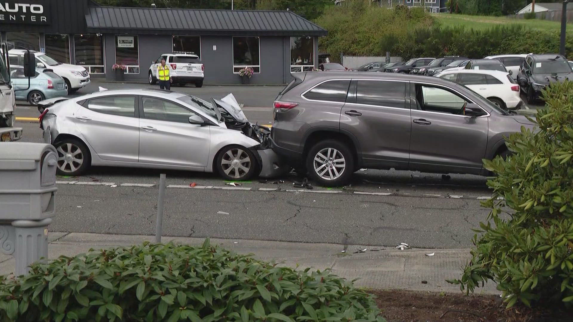 The driver exited his car to check for damage when the car that rear-ended him was also hit. The driver suffered major leg injuries.