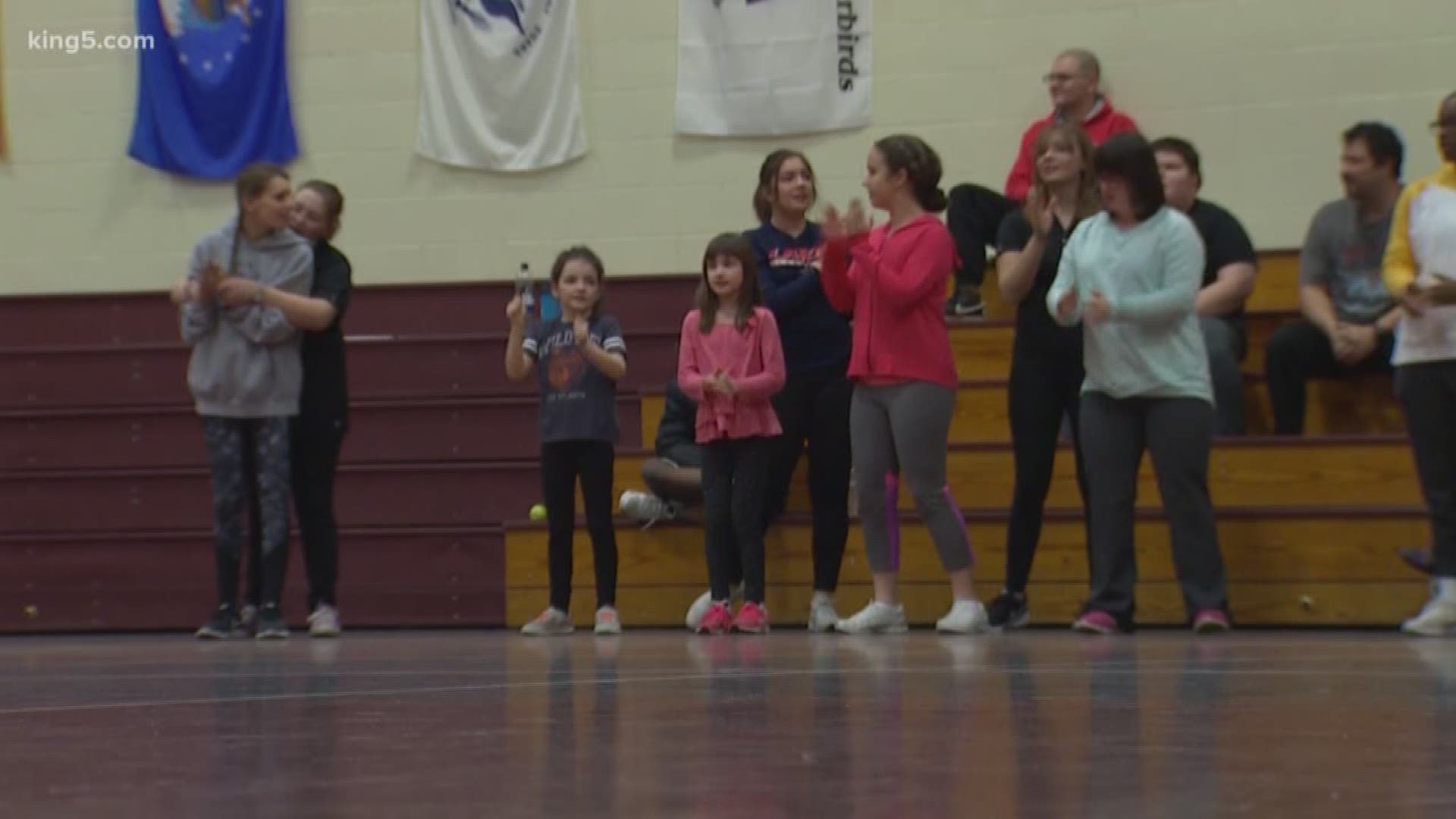 Three years ago, a teenager at Joint Base Lewis McChord had a dream of starting a cheer team for kids with special needs. Today, the JBLM Tigers light up the sidelines at other special olympics team sports, while building important connections. They are one of the first squads of their kind in the state.