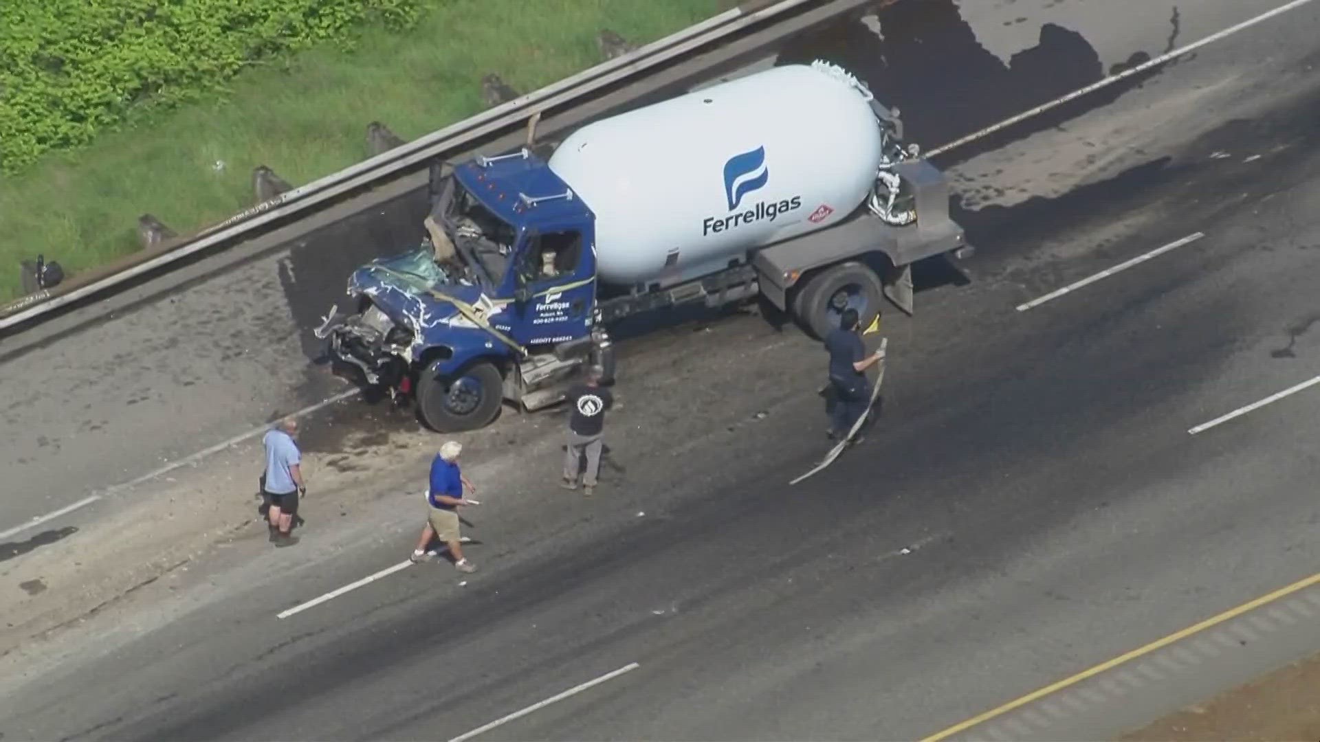 Two westbound lanes of Hwy 512 between S. Meridan and 31st Ave SW are closed following a propane truck accident.