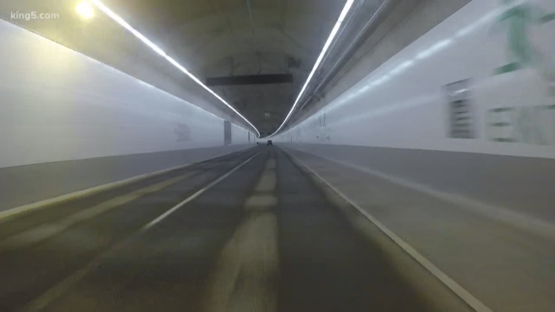 The first day to drive through Seattle's new Highway 99 Tunnel was a little slow due to the snow in western Washington. KING 5's Glenn Farley reports.