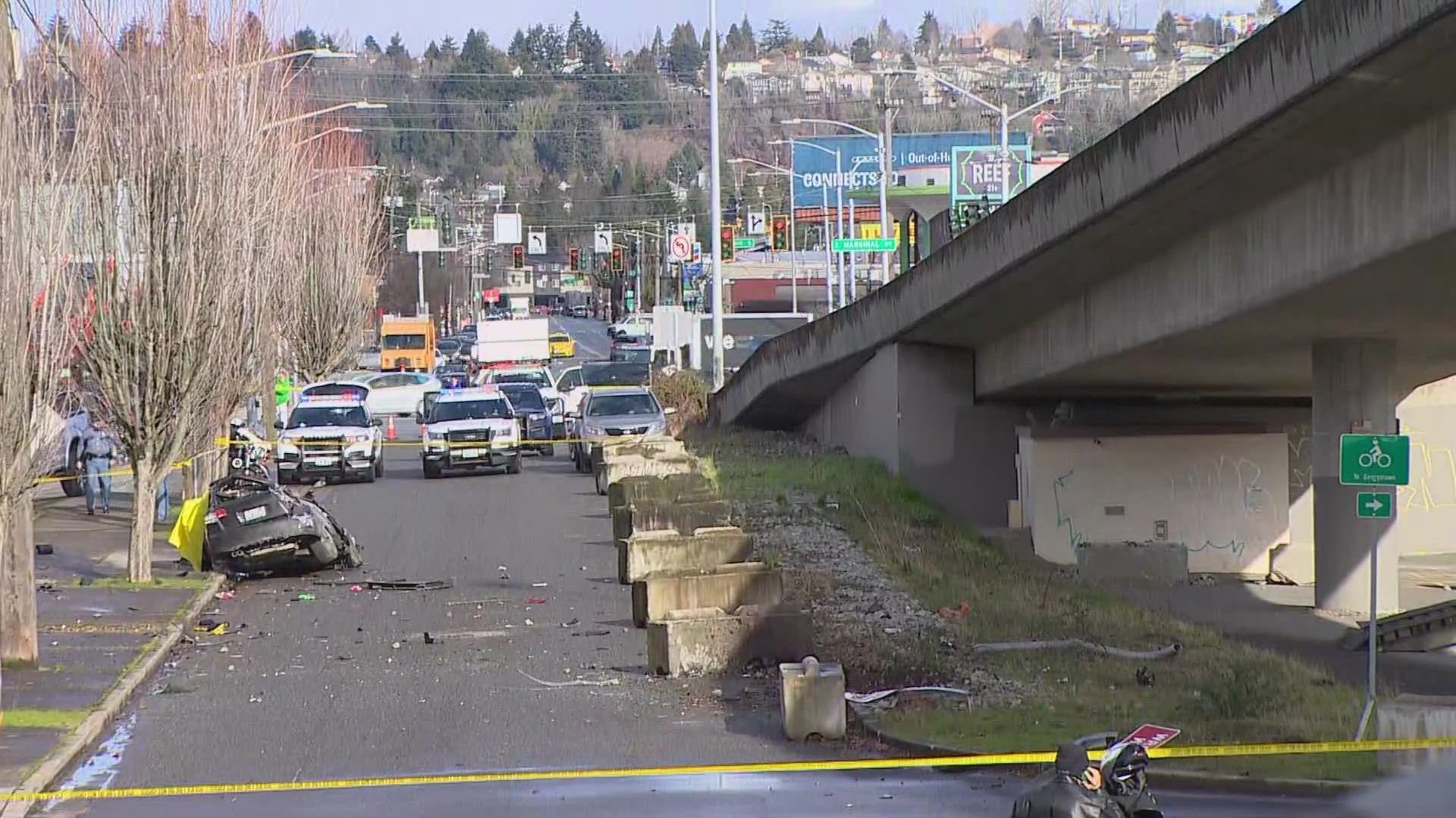 One person was found dead after a car drove off an overpass from the First Avenue Bridge in Seattle on Tuesday.