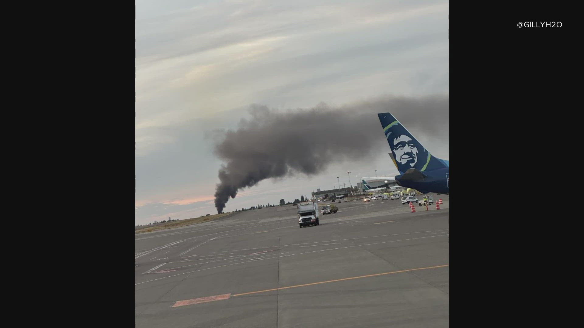 According to an airport spokesperson, the large plume of smoke is not impacting flights.