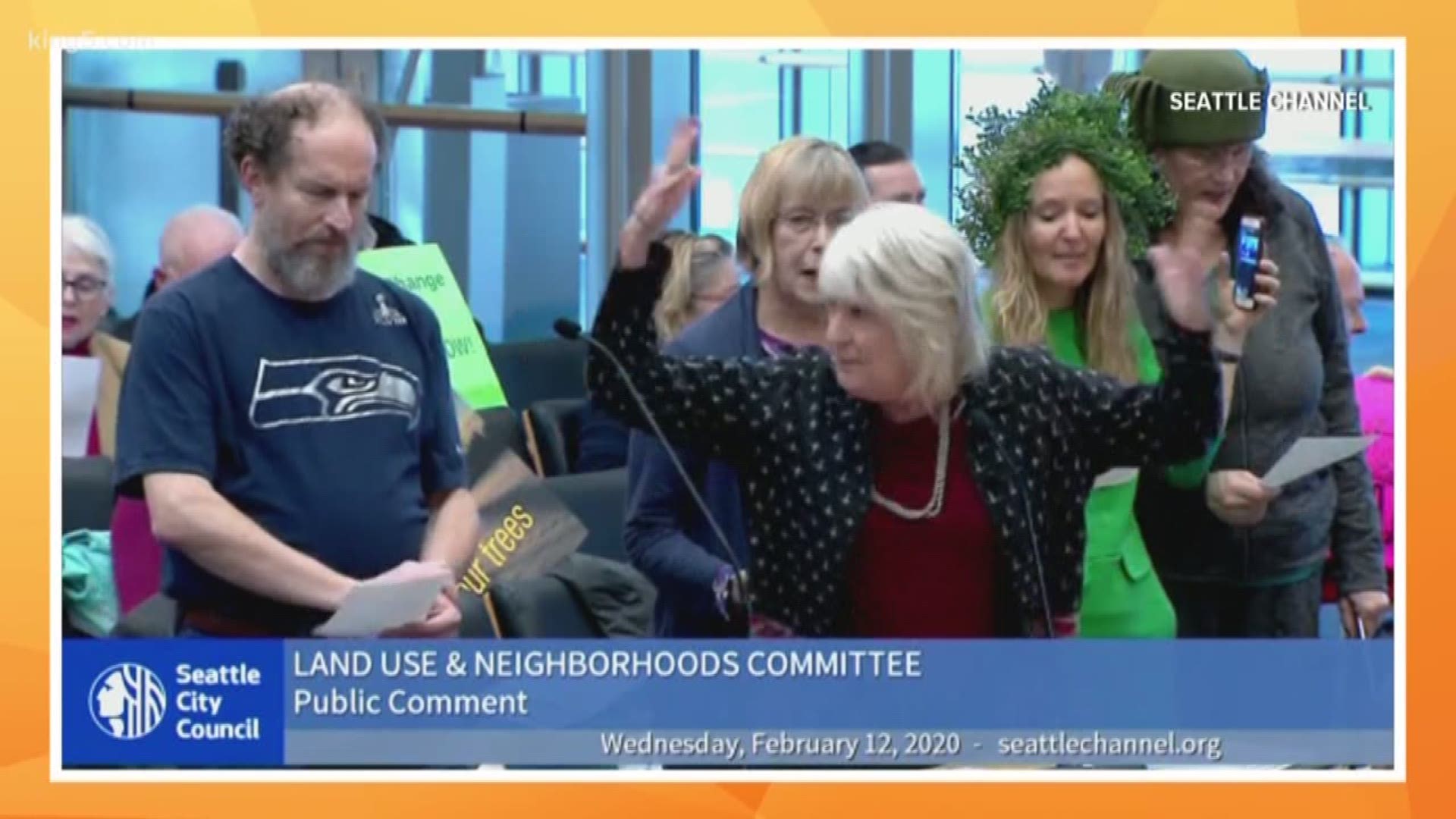 Seattle tree enthusiast Suzanne Grant led a group in song during public comment at a Land Use & Neighborhoods Committee meeting.
