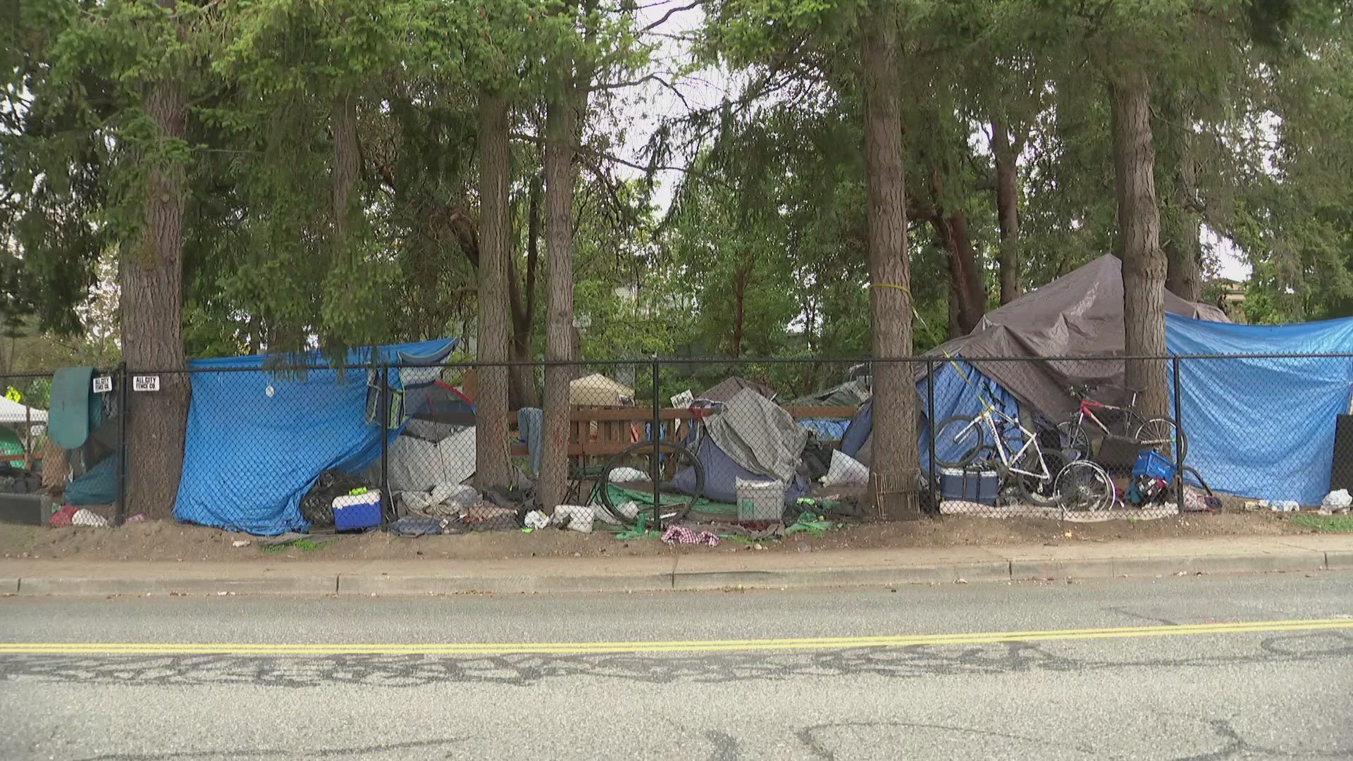 The encampment is located outside of the Burien courthouse.  The city is criticizing the county for not consulting with them first.