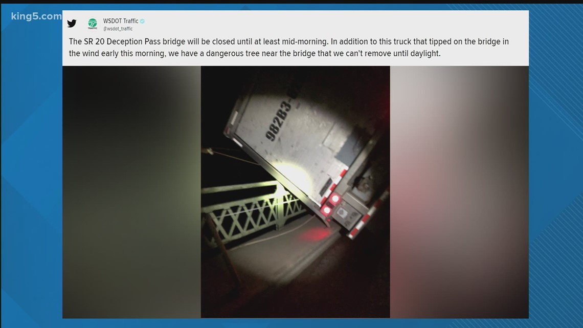 Semi-truck partially hanging over Deception Pass Bridge; SR 20 closed