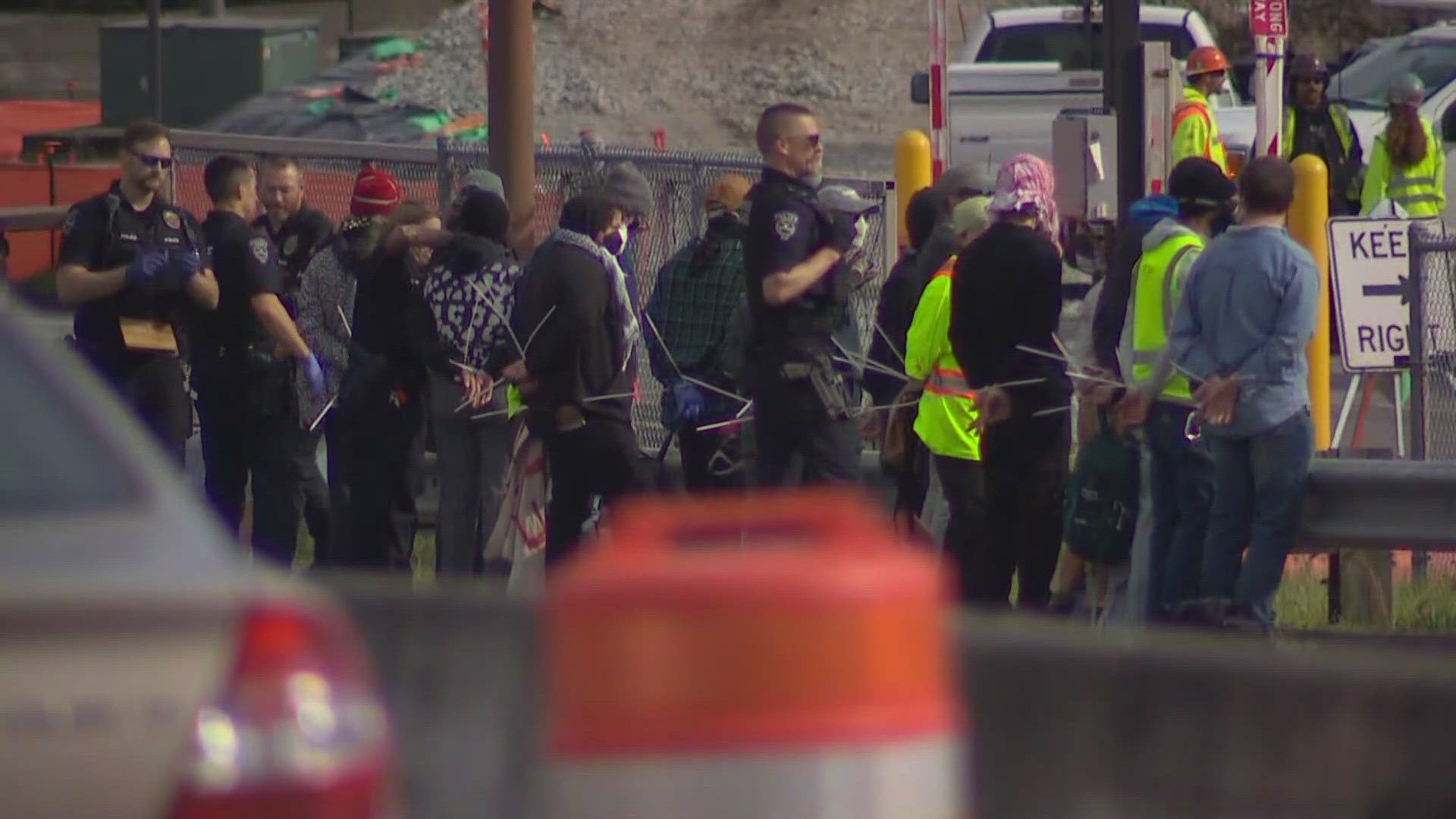The City of SeaTac says most of the people face charges for failure to disperse and disorderly conduct.