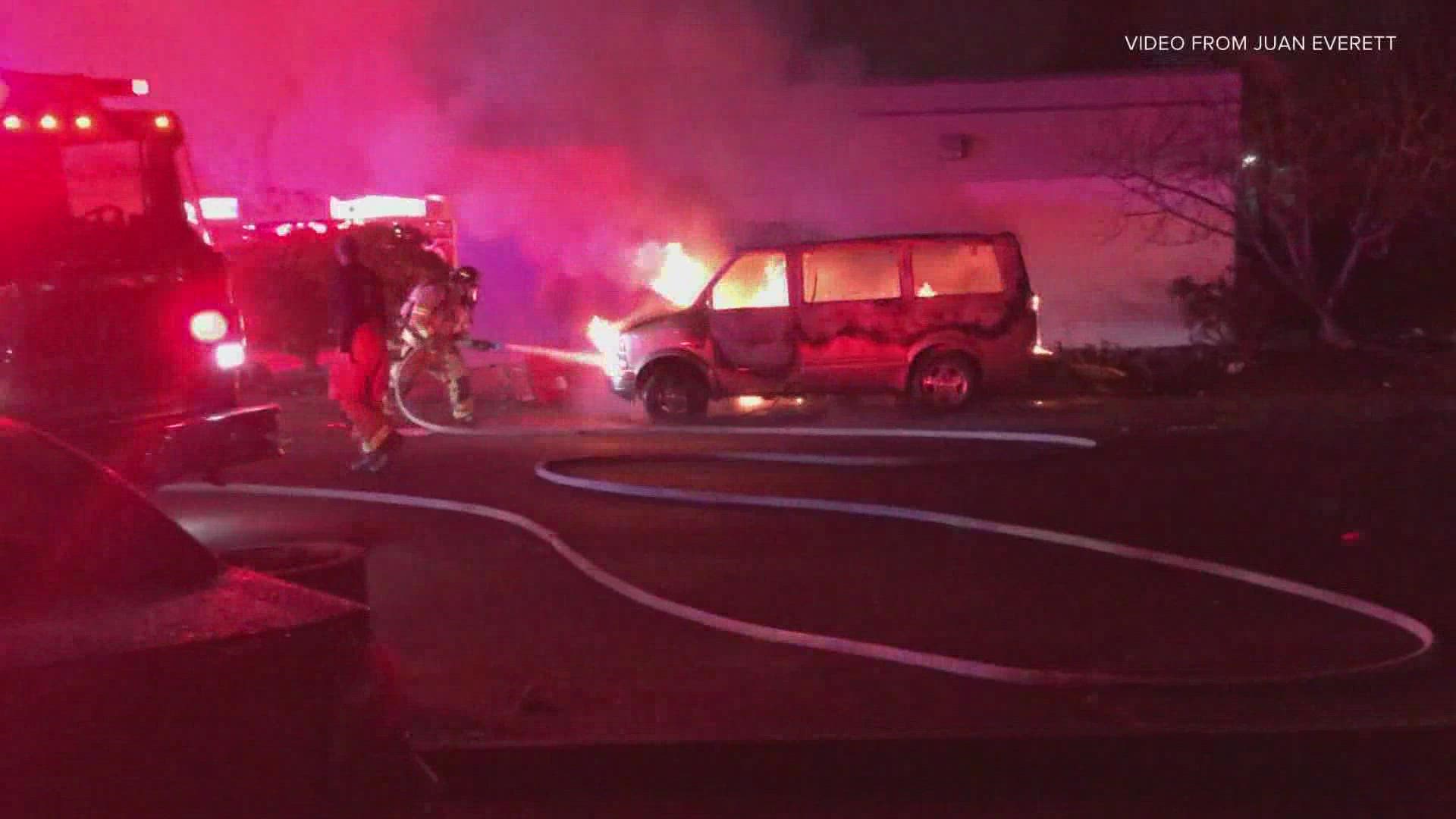 A bystander rescued two people from a van fire in Lakewood early Monday morning.