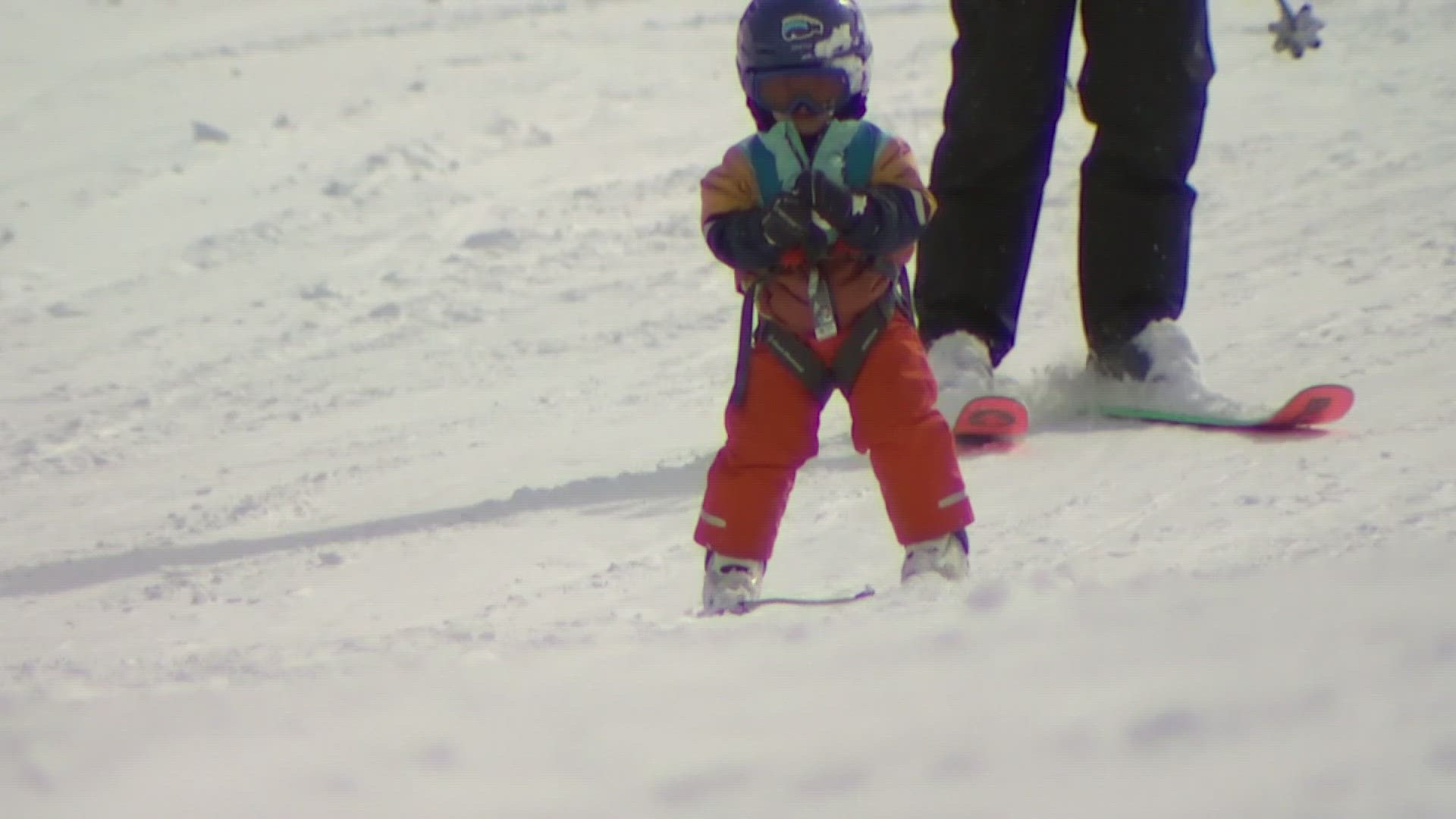 Skiers and snowboarders celebrate new snowfall at Crystal Mountain