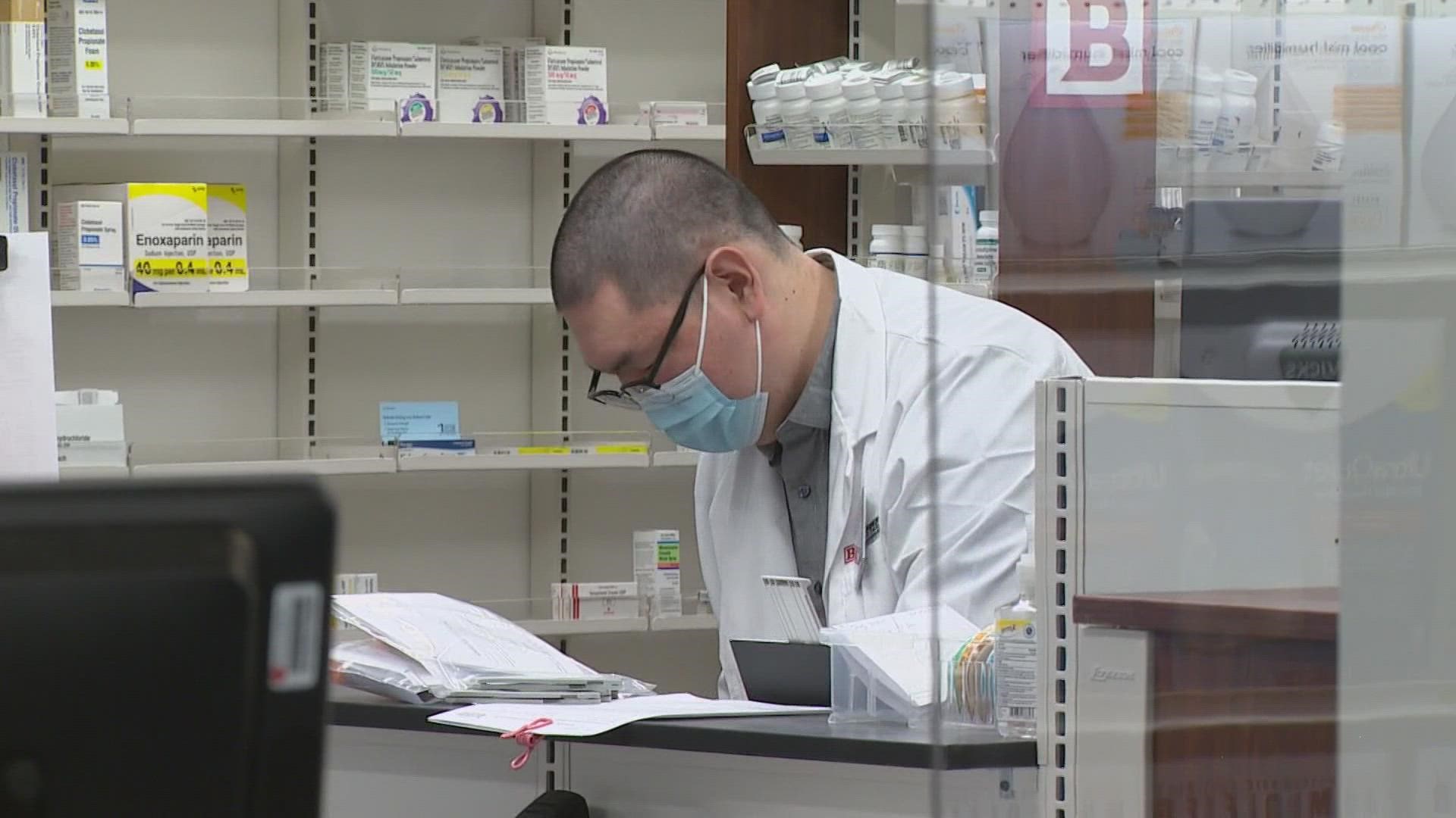 Staffing shortages and an overwhelming number of vaccine appointments led to long wait times at pharmacies in early 2022