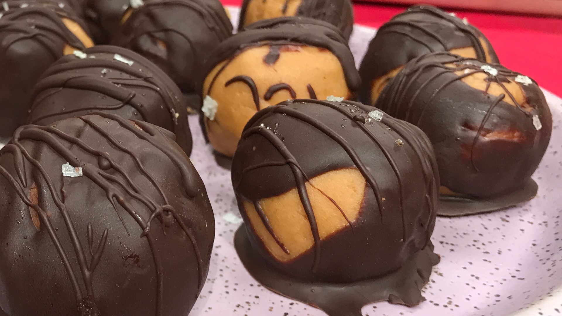 Nutrition coach, Lauren Chambers, shares her 'Salted Dark Chocolate Peanut Butter Balls' and to satisfy your sweet tooth without the guilt.