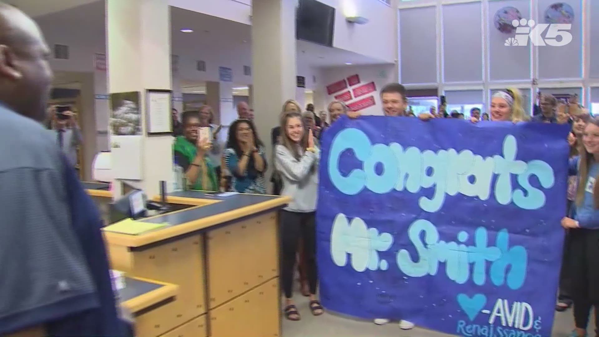 Jason Smith thought he was going to a regular staff meeting when the Rogers High School staff surprised him with the Josten's Educator of the Year award.