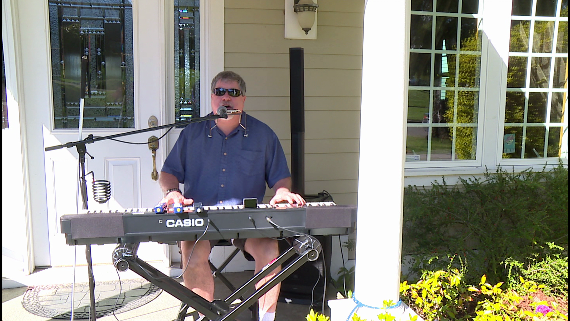 Musician Jim Meck has been covering The Beatles, Billy Joel and more from his front porch