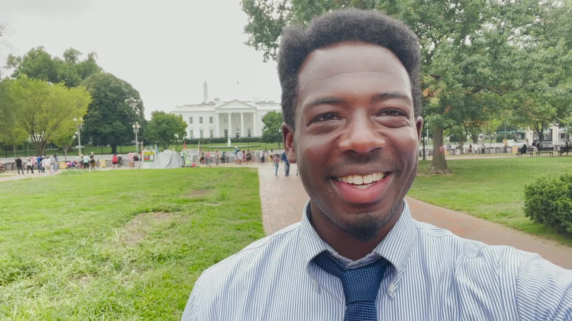 Kwabi Amoah-Forson drove across the country, handing out books to children along the way, in hopes to talk with President Biden about bringing the country together.