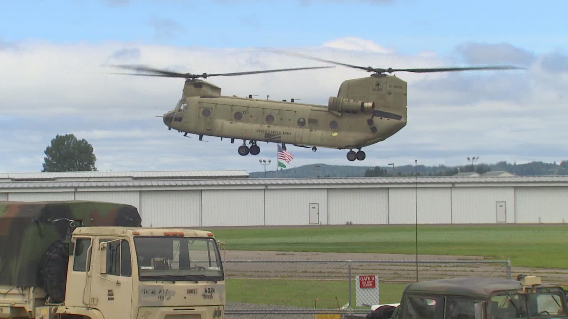 On Wednesday, military crews worked on refueling helicopters outside of Joint Base Lewis-McChord.