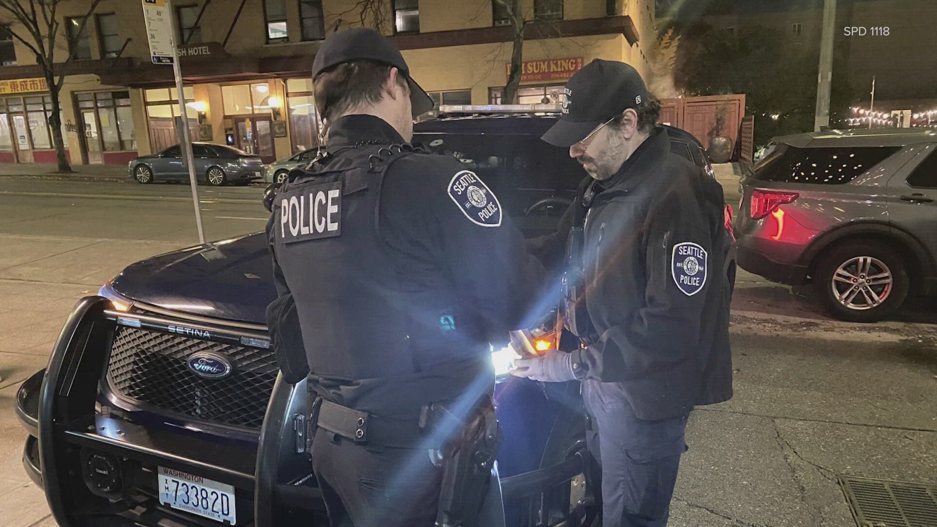 A woman was shot following an armed robbery at a business in the 600 block of South Jackson St. in the Chinatown International District