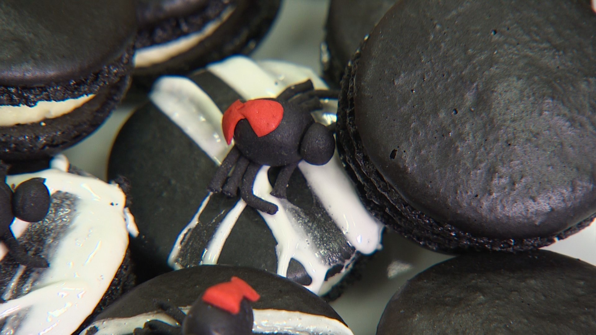 Spider web macarons are a spooky Halloween treat from this reality TV and BB Nest Baker in Bothell