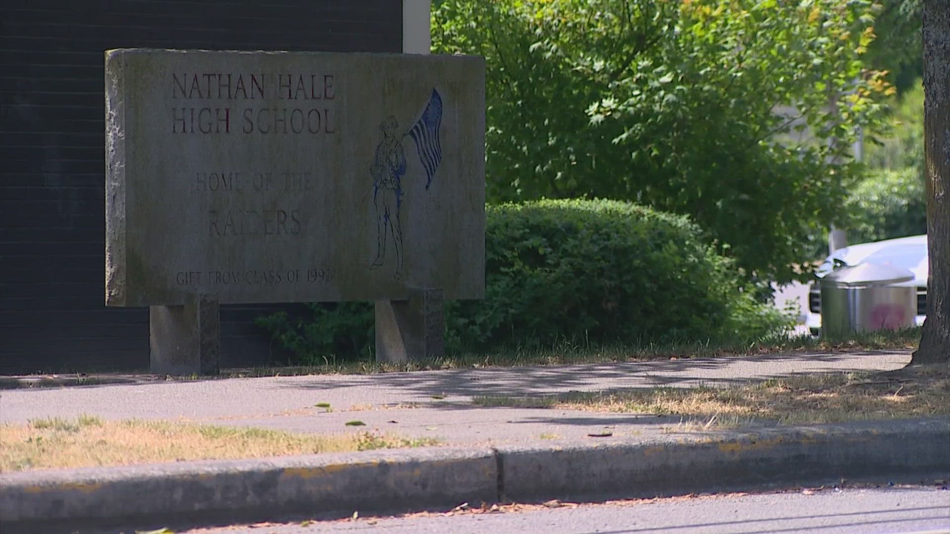 The lawsuit filed by the 15-year-old's family said a "mob" of 20 students tried to attack her on campus.