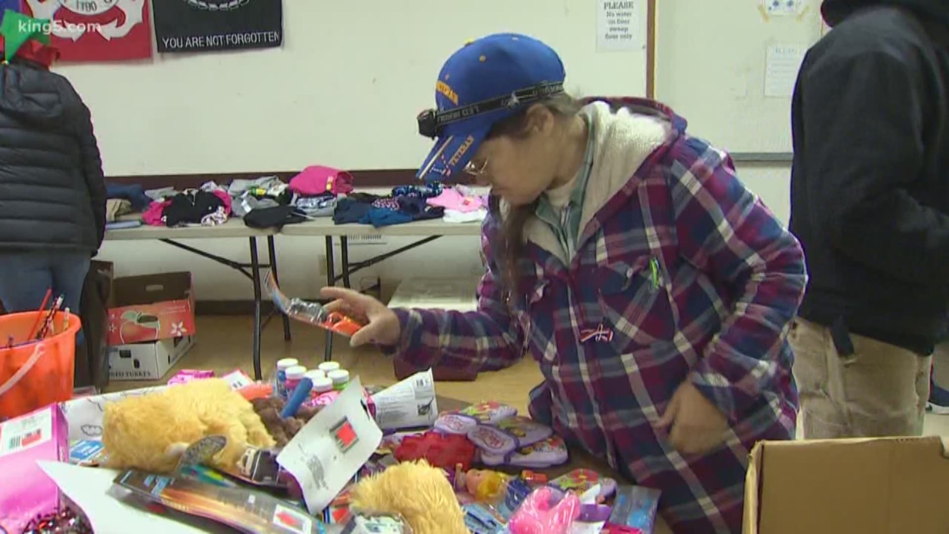 It was an emotional Saturday in Port Orchard as hundreds lined up for the South Kitsap Helpline's Holiday giveaway. The event allows families who are struggling to pick out Christmas gifts for their children.