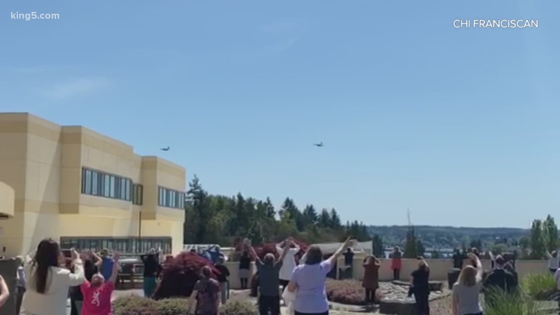 Two C-17s flew over the Puget Sound region to salute people working at the forefront of the coronavirus pandemic on Friday, May 8.