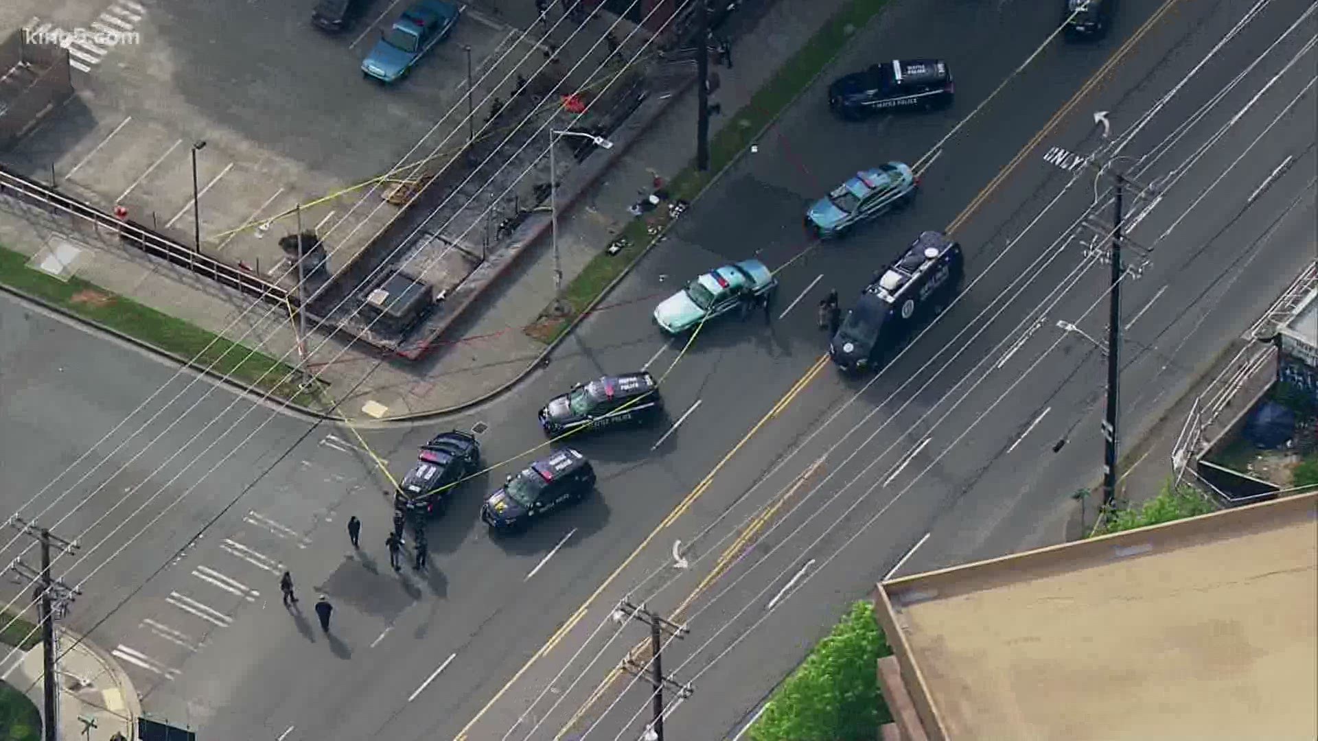 Police shot a suspect who was allegedly armed with a knife in Lower Queen Anne on Tuesday.