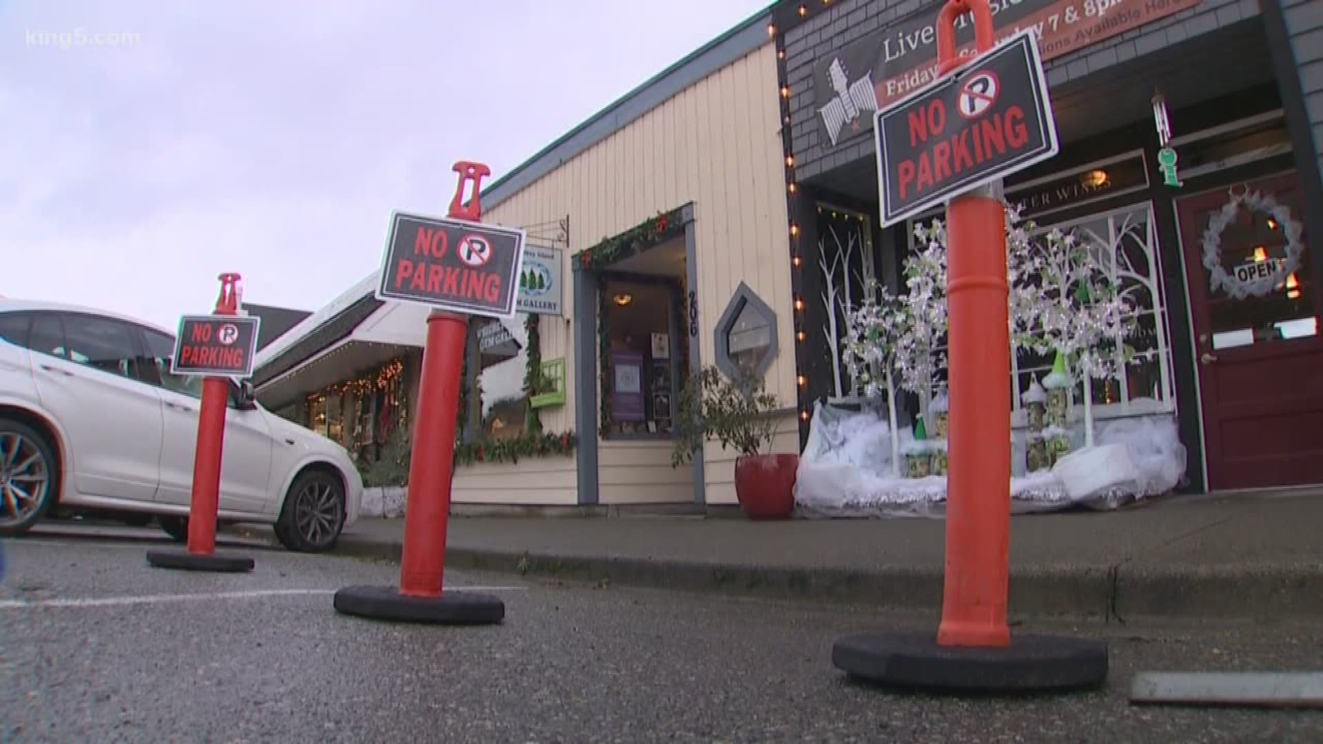 Langley is putting a hold on some road construction after an outcry from local business owners who say the work was interfering with their holiday shopping season.