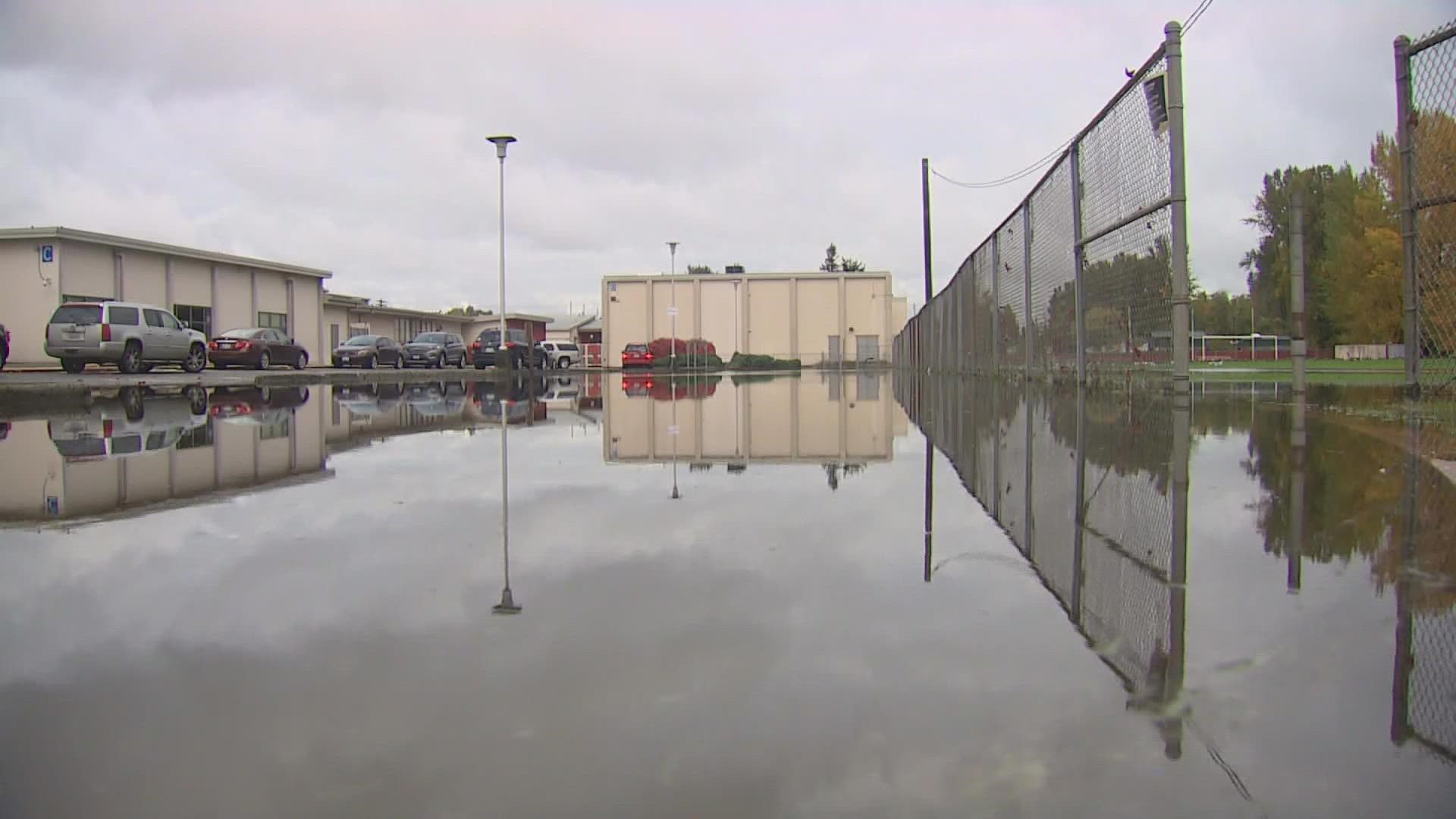 Thursday's rainfall left streets, and schools, flooded for much of Friday.