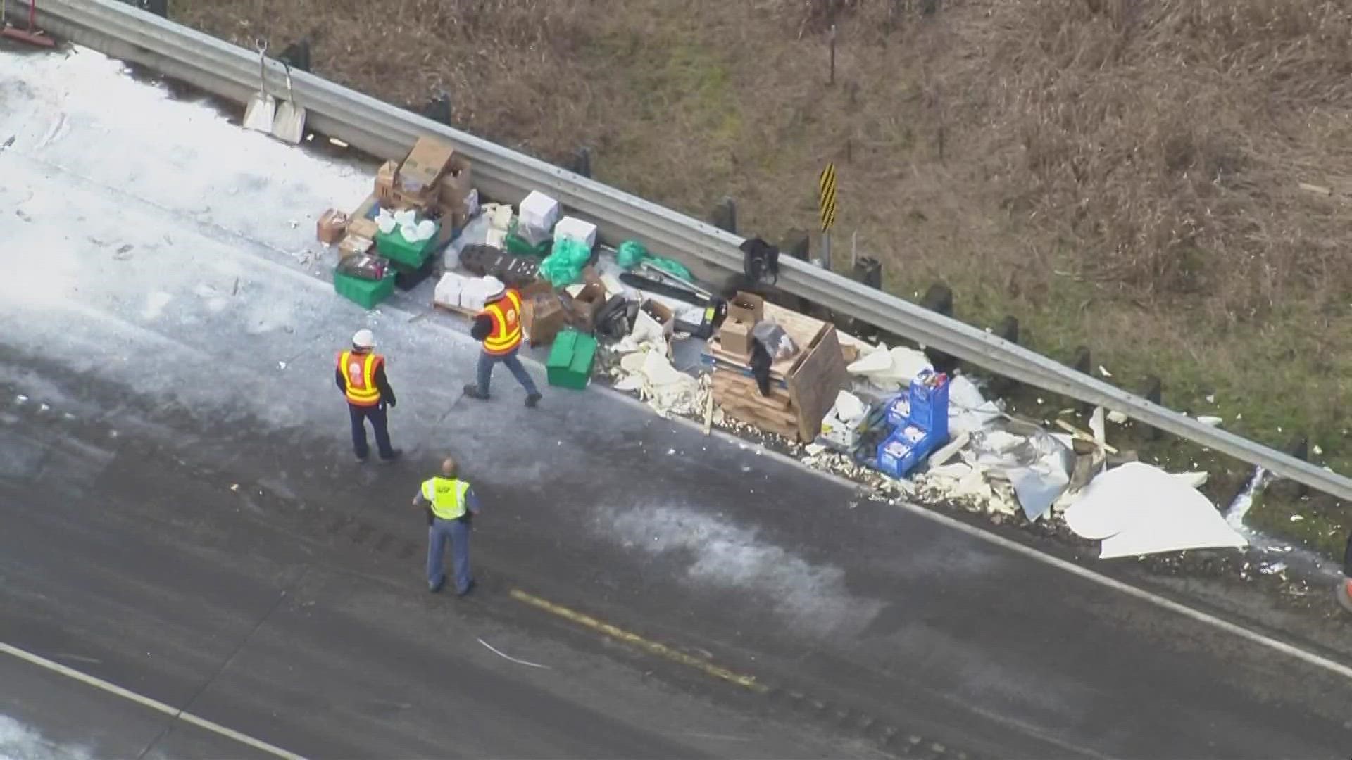 State Route 507 was fully blocked between Roy and Spanaway near East Gate Road due to a rollover crash involving a semi-truck.