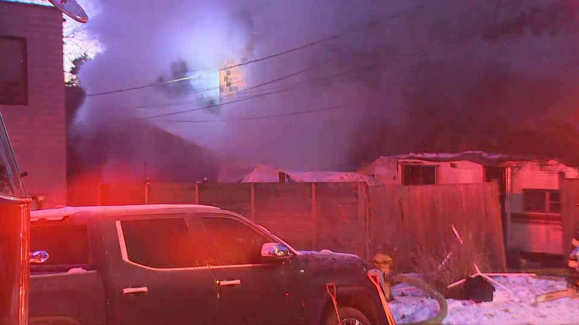 Woman in critical condition after rescue from seattle house fire