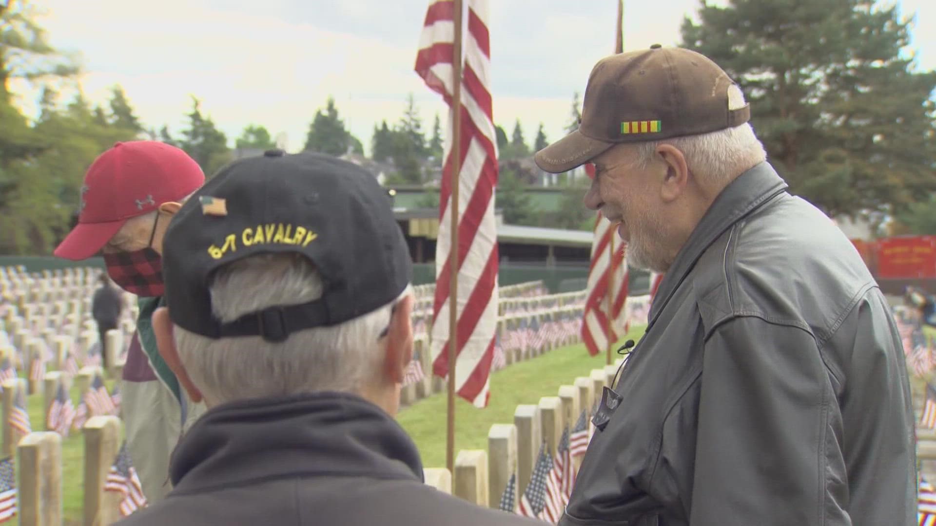 People visited Evergreen Washelli's Veterans Memorial Cemetery to walk the rows of tombstones naming military heroes who never came home.