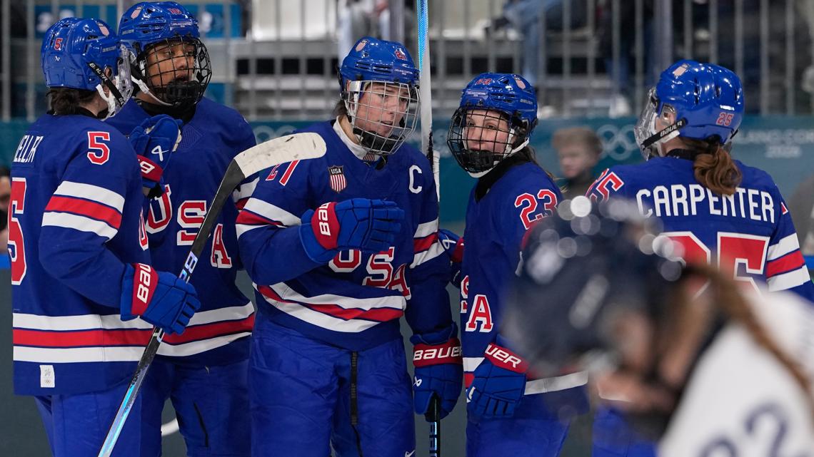 United States' Hilary Knight celebrates with teammates after scoring her sides fourth goal during a preliminary round match on Feb. 7, 2026.