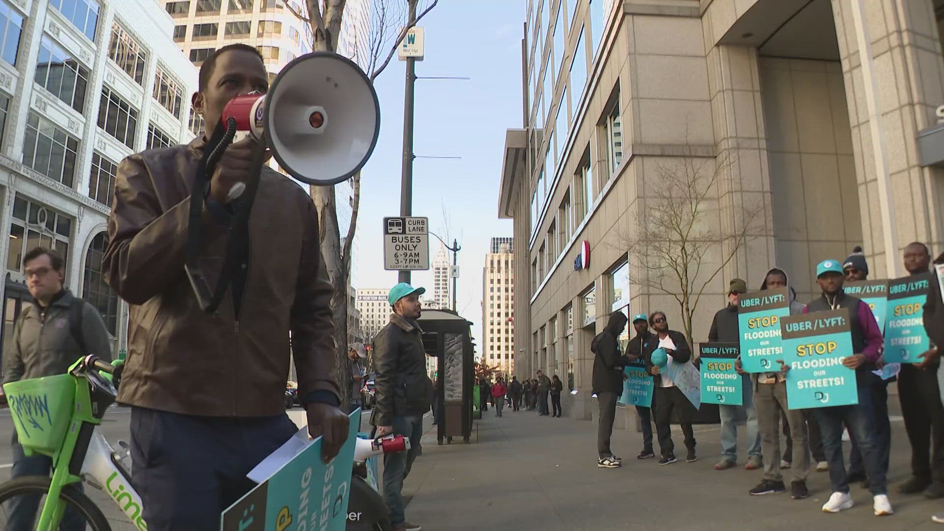 Members of the Washington Drivers Union gathered at Uber’s engineering offices in downtown Seattle on Wednesday during rush hour, chanting and holding megaphones.