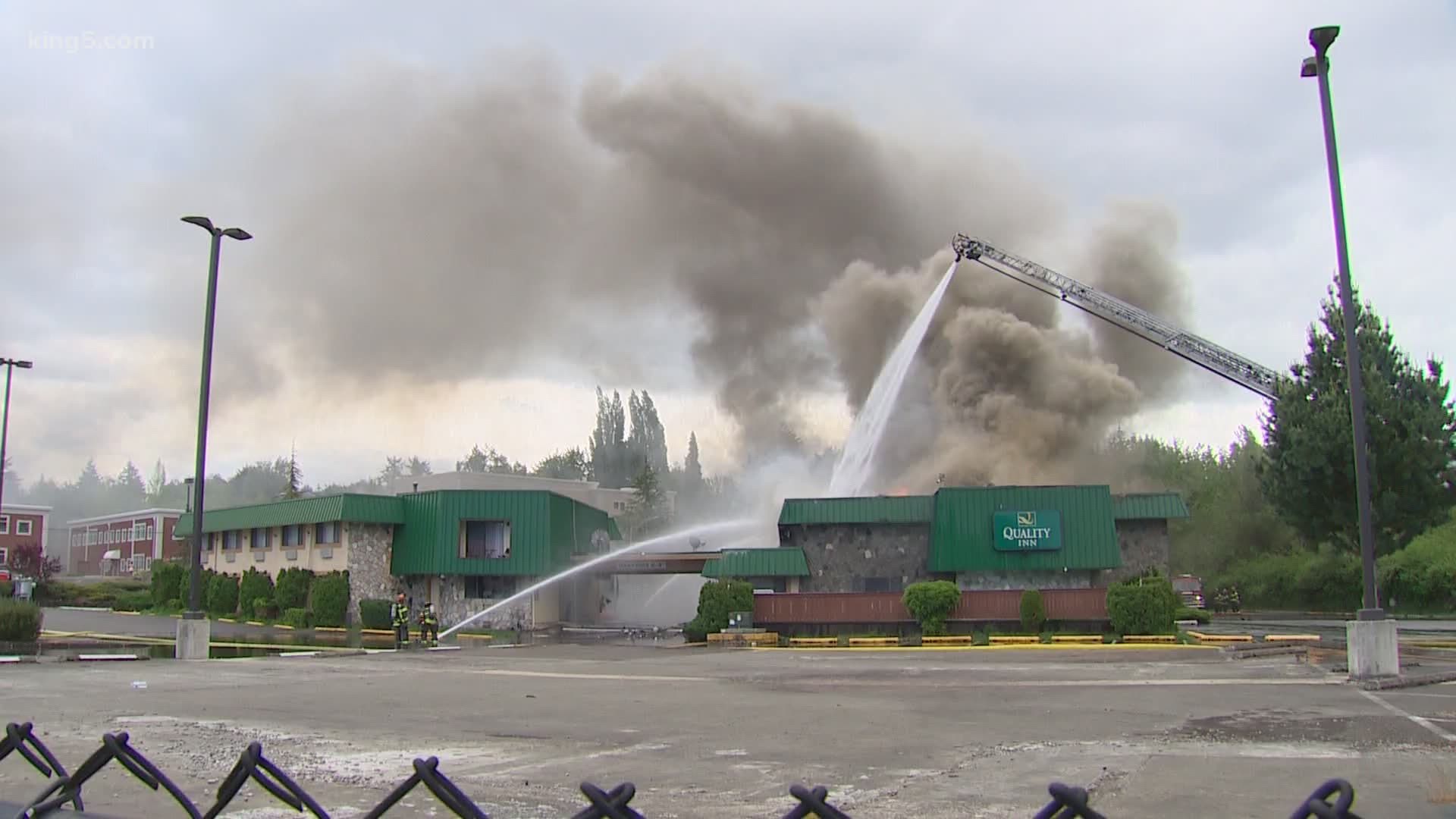 Roughly 80 people were evacuated after a Quality Inn in Olympia caught fire Friday. Officials say because of when the building was built, there were no sprinklers.