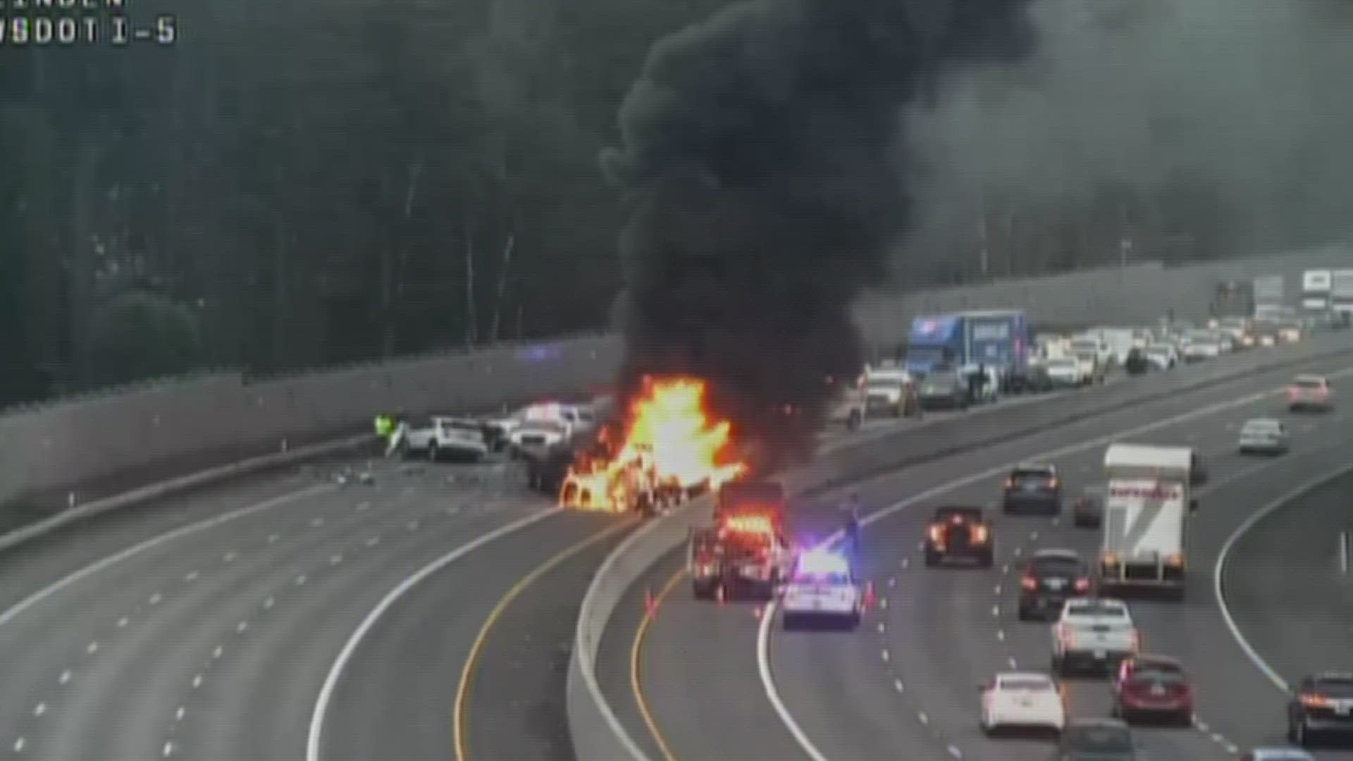 All lanes of Interstate 5 were blocked at milepost 120 near Joint Base Lewis-McChord following a crash and car fire on Monday just after 3 p.m.