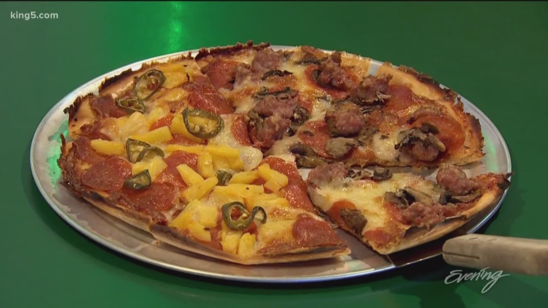 Friendly dive bar with a pizza that earns its fame from its unique thin crust.