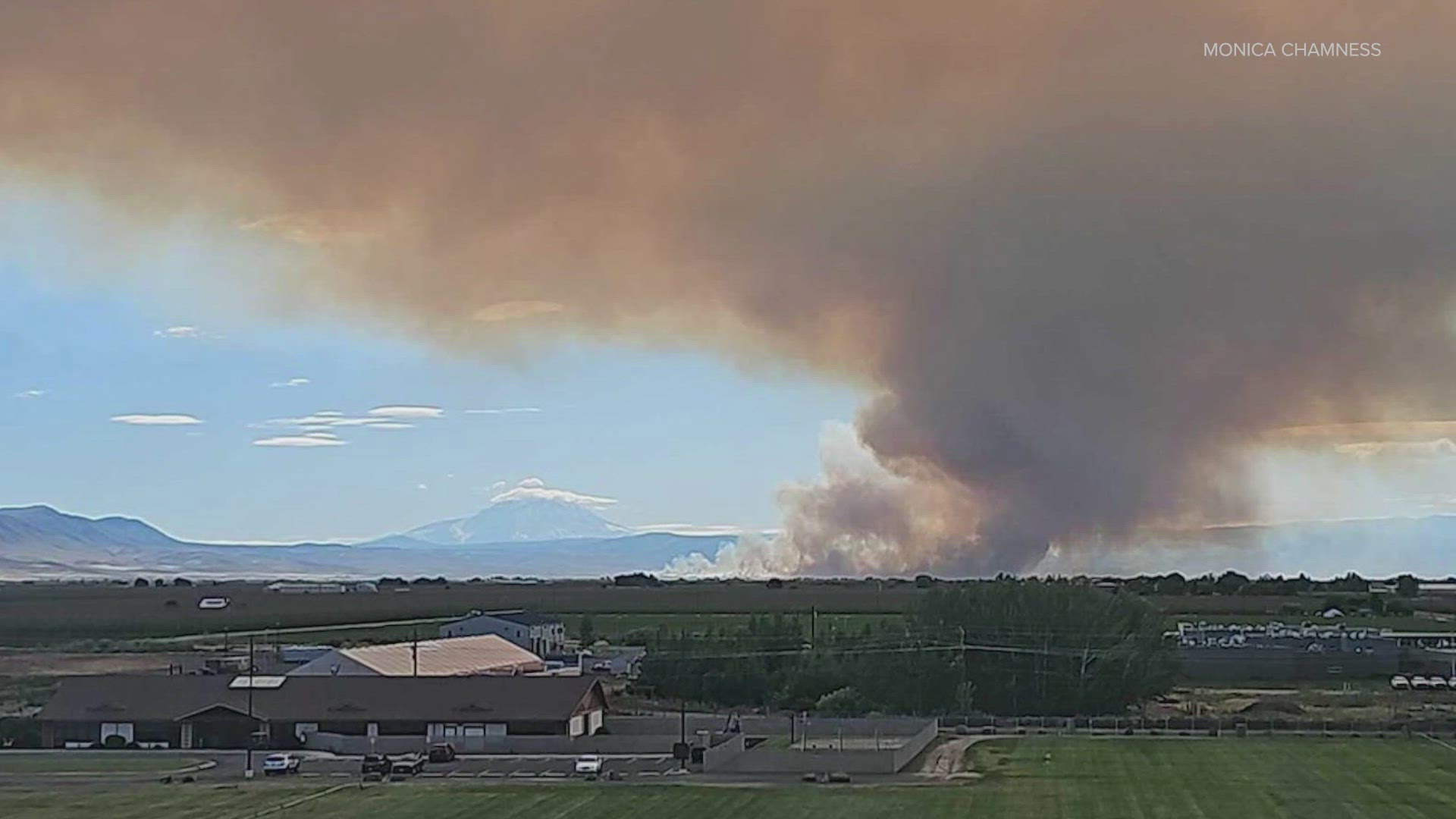 Yakima fire officials estimate over a dozen structures, many of which were homes, were lost in a wildfire burning near White Swan in central Washington.