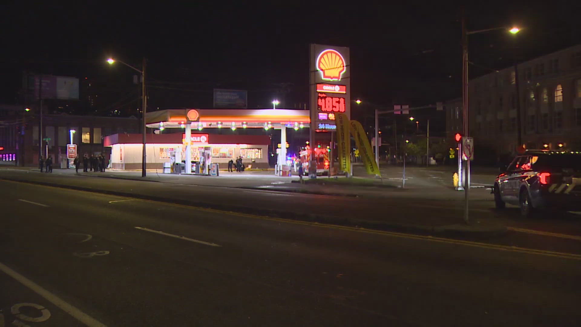 A clerk at a Shell gas station in Seattle's Chinatown International District was arrested after he allegedly fired a gun at a customer's car following a dispute