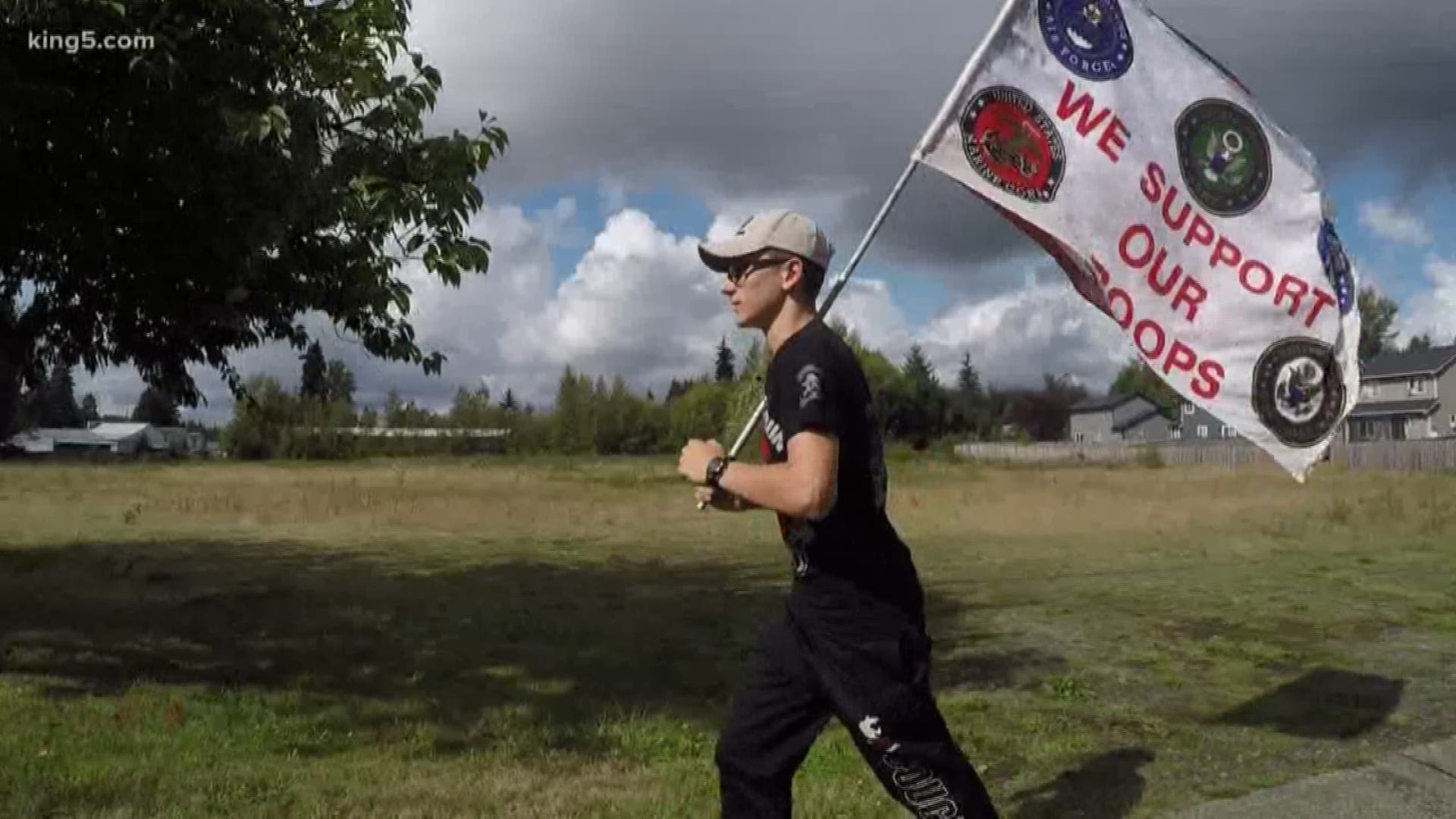 Tyee Eliason runs two to three miles a day carrying the American flag to prevent veteran suicides.